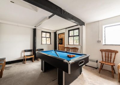 Self-catering holiday cottage with games room for 16 guests | Cae Madog Barn