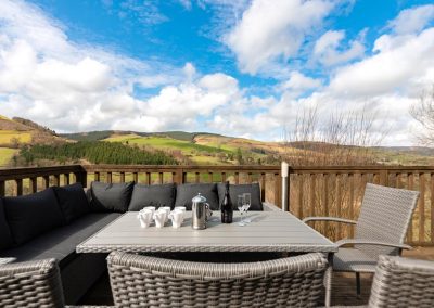 Holiday cottage with outside seating, pool, BBQ and hot tub in Wales | Cae Madog Barn