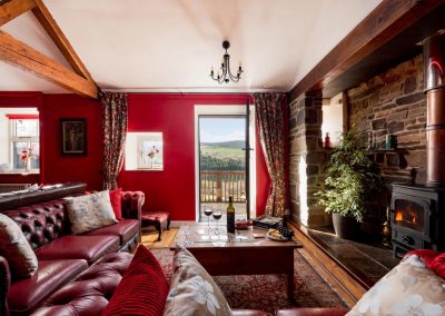 Dog-friendly holiday cottage in Wales with a woodburner | Cae Madog Barn