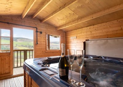 Large holiday cottage with hot tub and pool in Wales | Cae Madog Barn