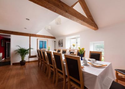Large dining room and spacious holiday cottage in Wales | Cae Madog Barn